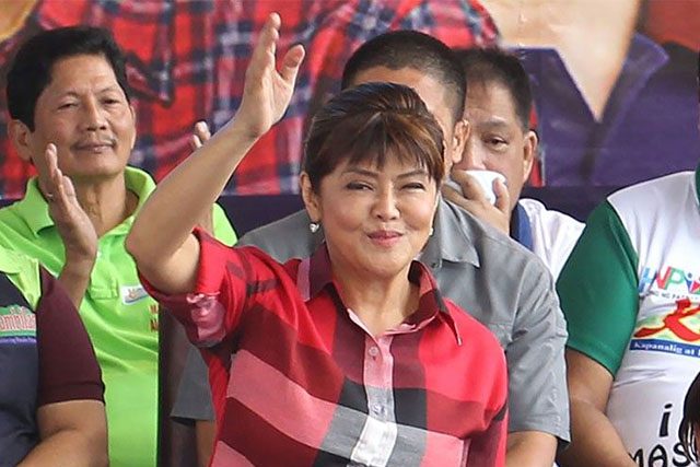 Imee Marcos waving at crowds