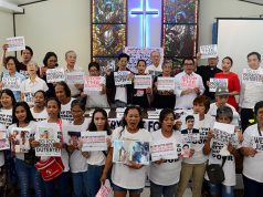 Activists and families of drug war victims display placards during a protest against the war on drugs by President Rodrigo Duterte in Quezon city