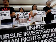 War on numbers: Philippines targets drug killing data Members of the human rights groups hold banners calling to investigate Philippine President Rodrigo Dutere