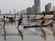 Vietnamese fishermen call for action against China Vietnamese fishermen pull the fishnets on a beach in Da Nang city