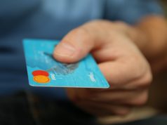 Person holding a credit card