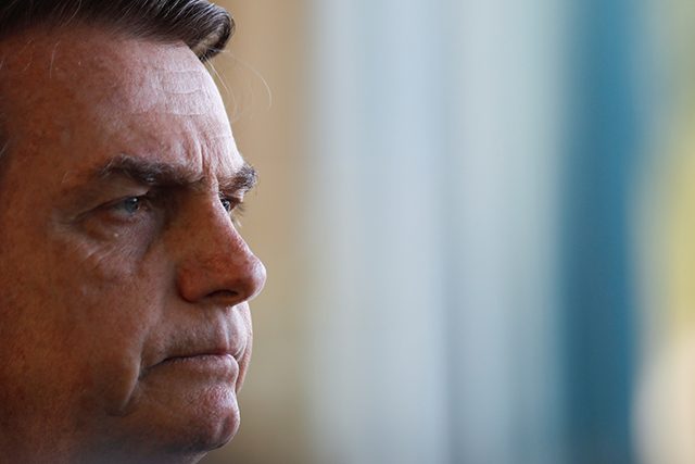 Brazil's President Jair Bolsonaro looks on during a news conference with Chile's President Sebastian Pinera (not pictured) at the Alvorada Palace in Brasilia
