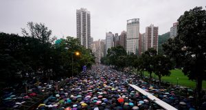 Anti-extradition bill protesters march to demand democracy and political reforms, in Hong Kong