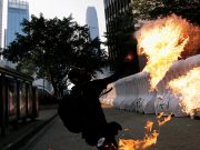 Hong Kong reopens after violent weekend of clashes and protests An anti-government protester in Hong Kong