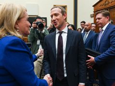 Facebook Chairman and CEO Mark Zuckerberg greets Rep. Garcia after testifying at a House Financial Services Committee hearing in Washington