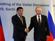 Russia's President Putin shakes hands with Philippines' counterpart Duterte during their meeting in Sochi