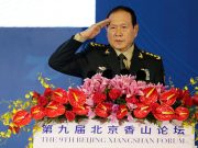 Chinese Defense Minister Wei Fenghe salutes before a speech at the Xiangshan Forum in Beijing