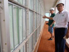 Zhang Xiangjun, manager of New Hope Liuhe's Binh Phuoc pig farm, shows journalists the farm's filtering systems as part of its biosecurity measures against African swine fever disease in Binh Phuoc
