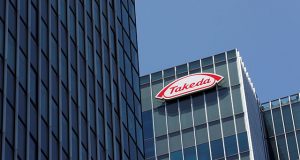 Takeda Pharmaceutical Co's logo is seen at its headquarters in Tokyo