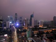 General view of a business district at sunset in Jakarta