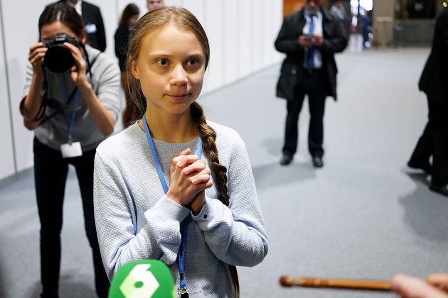 Climate change activist Greta Thunberg speaks to media during COP25 climate summit in Madrid