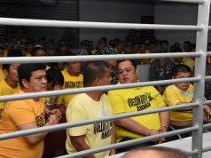 Members of the Ampatuan family sit with other suspects in the 2009 Maguindanao Massacre at the promulgation of the case, inside a prison facility in Taguig City