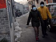 ‘Postpone Valentine’s Day,’ a Supreme Court justice suggests amid virus scare Beijing residents wearing face masks