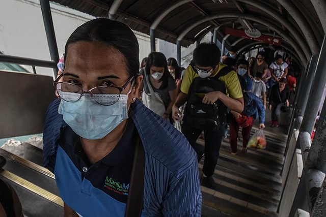 Commuter wearing face mask