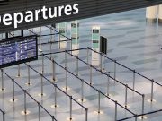 To suspend or not to suspend: Sans DOH order mayors, schools cancel classes amid rising COVID-19 cases Woman walks near an empty departures gate at Haneda Airport in Tokyo