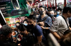 Commuters with masks