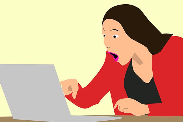 Graphic of a woman looking in a laptop