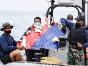 Indonesia locates black boxes of crashed jet as body parts recovered