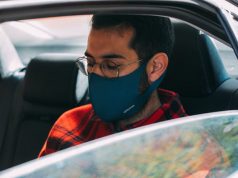 Passenger with face mask