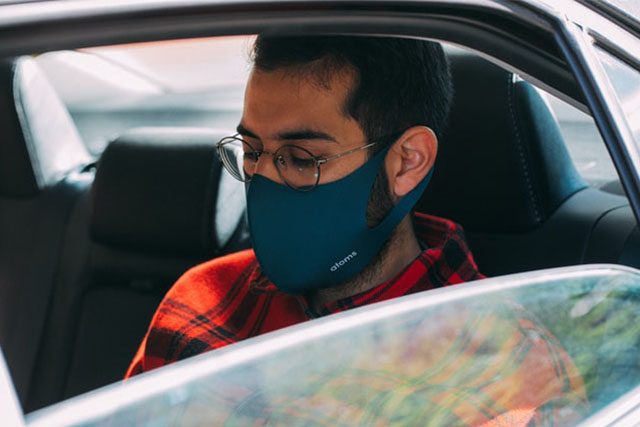 Passenger with face mask