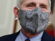 Fauci says it is possible Americans will still be wearing masks in 2022