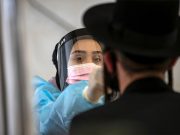 Israel scraps indoor mask order as COVID-19 infections wane