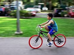 Kid riding bicycle