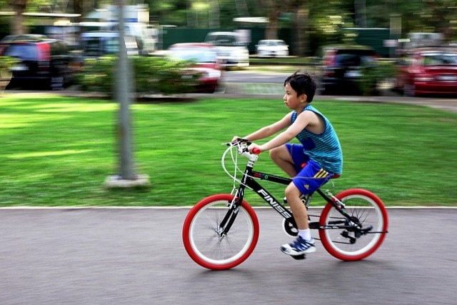 Kid riding bicycle