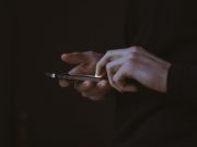 Person holding a smartphone