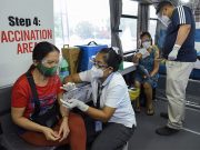 Philippines to open COVID-19 vaccinations to include more workers