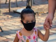 Science shows mask-wearing is largely safe for children Child with face mask