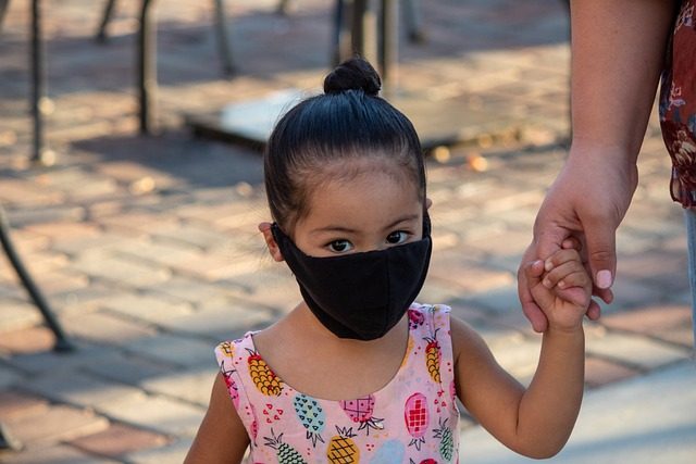 Child with face mask
