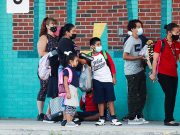 Kids with COVID-19 often have no symptoms; smoking linked to vaccine response Children at school