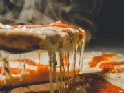Taguig pizzeria earns ire of anti-vaxxers over promo for the vaccinated Pizza
