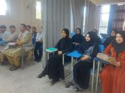 A curtain divides male, female students as Afghan universities reopen
