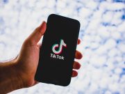 From dare to partnership: TikTok teams up with Comelec for reliable info dissemination on 2022 elections TikTok on phone