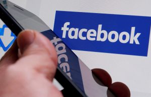 Smartphone and Facebook logo