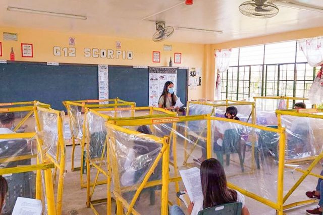 Plastic barrier in Masbate classroom