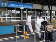 Omicron’s global spread prompts renewed lockdowns, delayed reopenings