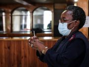 South Africa says no signal of increased Omicron severity yet South African worker