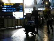 WHO says vaccination, not travel curbs, key to battling Omicron Travellers in Tangerang