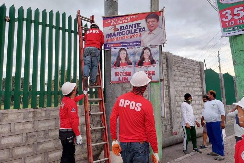 Comelec urged to look into dismantling of tarps in private properties