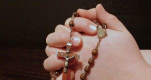 Hands with rosary