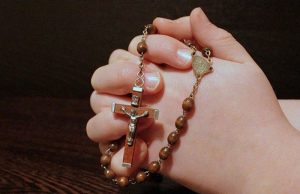 Hands with rosary