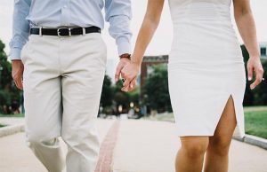 Couple holding hands