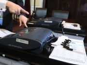 Smartmatic execs charged with bribing Philippine official for voting tech contracts Smartmatic machine