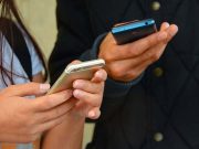 Faith meets tech: Online companion guides Visita Iglesia pilgrims People using smartphones
