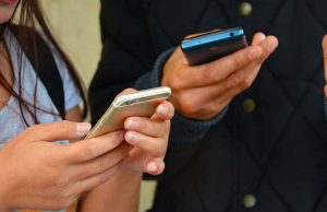 People using smartphones