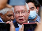 Sentence halved for Malaysia’s ex-PM Najib, jailed in 1MDB scandal