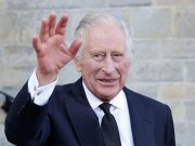 Can Britain’s King Charles fill his treasured mother’s shoes? King Charles waving